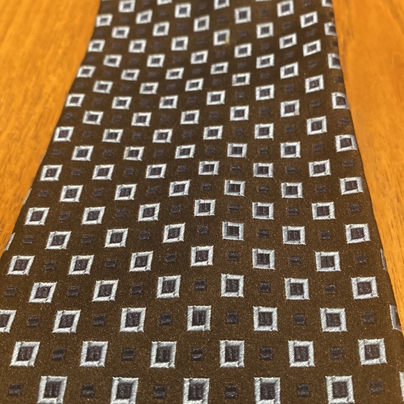Silk tie by Chaps in dark brown and blue highlights.  In like new condition 3.5” - Picture 2 of 5